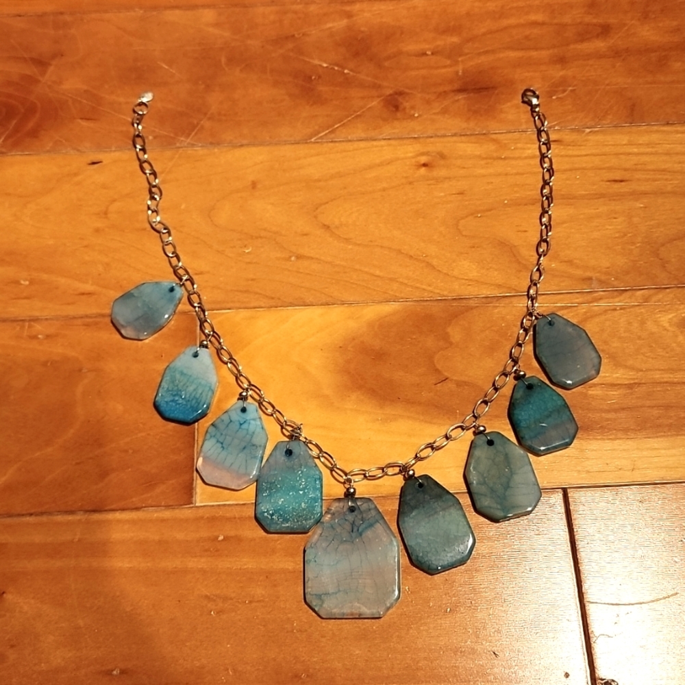 Silver necklace with blue stones